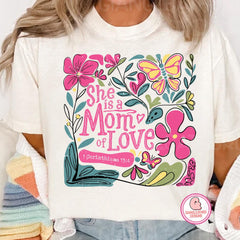 She is a mom of love shirt, botanical flowers mama shirt, mothers day shirt, mama shirt, Bible verse Shirt, Christian Mothers Day shirt, Mama Shirt