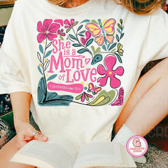 She is a mom of love shirt, botanical flowers mama shirt, mothers day shirt, mama shirt, Bible verse Shirt, Christian Mothers Day shirt, Mama Shirt