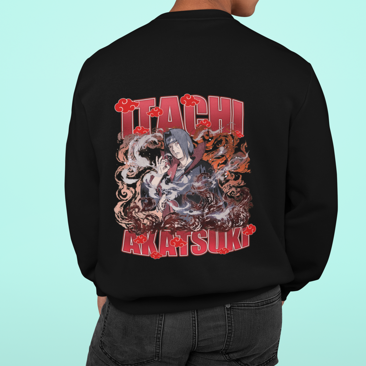 a man wearing a black sweatshirt with an image of a demon on it