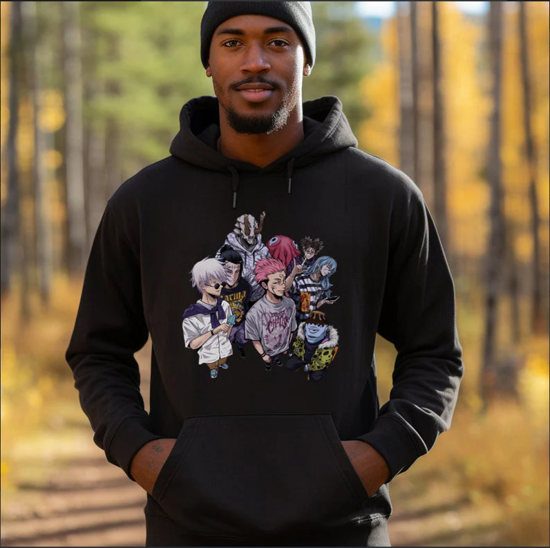 a man wearing a black hoodie with anime characters on it