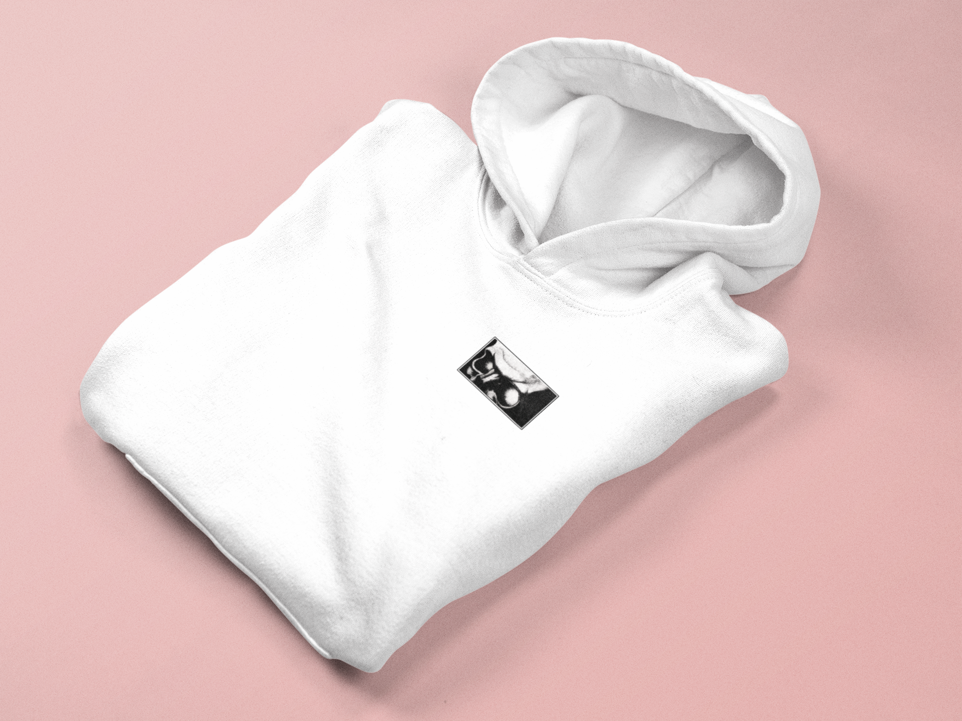 a white hoodie with a black square logo on it