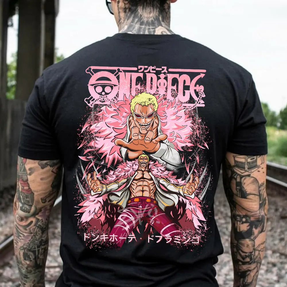 a man wearing a black shirt with a pink design on it