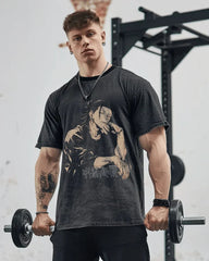 a man with a tattoo on his arm holding a barbell